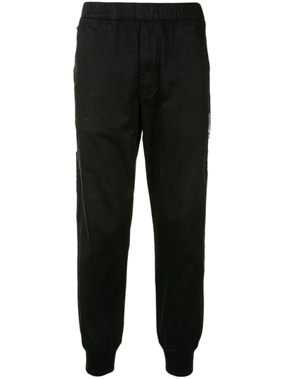 Shop Aape By A Bathing Ape Aape Universe Tapered Trousers In Black