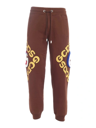 Shop Gcds Logo Prints Pants In Brown