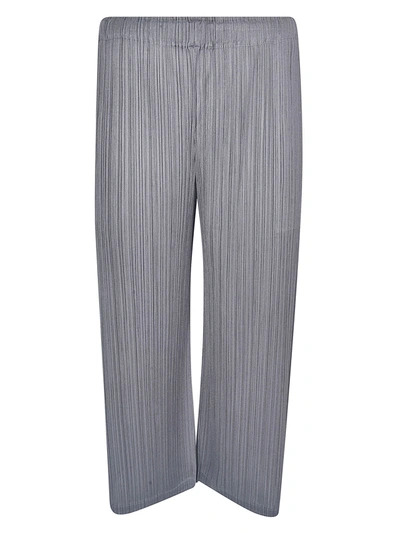 Shop Issey Miyake Pleat Effect Cropped Trousers In Grey