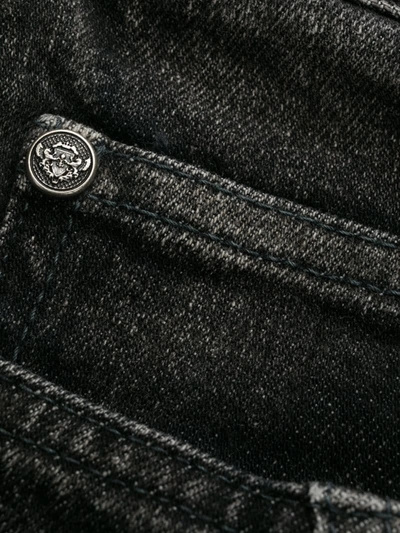 Shop Balmain Stonewashed Skinny Jeans In Black