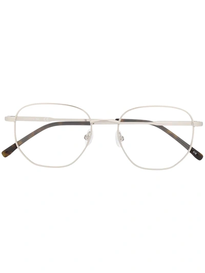 Shop Lacoste Hexagon Frame Glasses In Silver