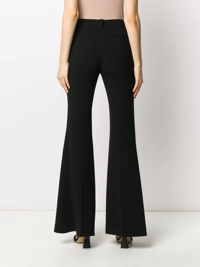 Shop Michael Michael Kors 70s Flare Trousers In Black