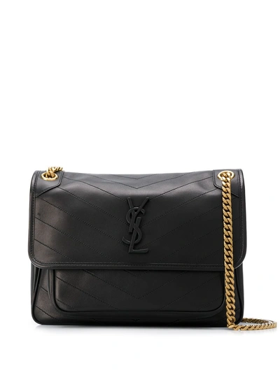 Shop Saint Laurent Niki Leather Handbag In Black