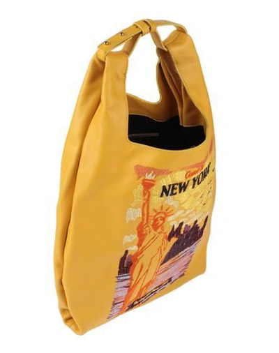 Shop Alessandro Enriquez Handbags In Yellow