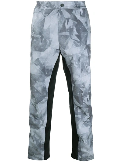 Shop White Mountaineering X Colman Age Geometric Print Trousers In Grey