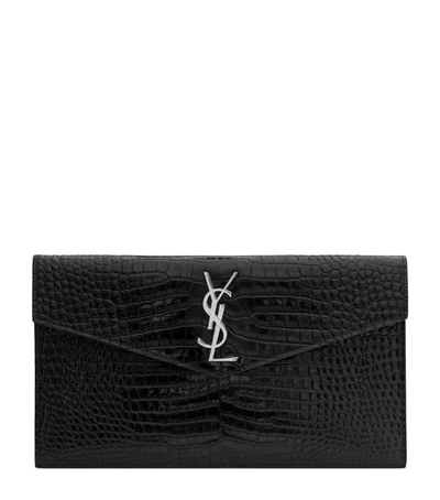 Shop Saint Laurent Leather Uptown Clutch Bag In Black