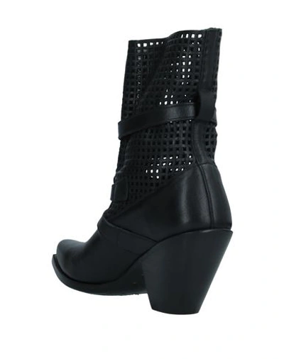 Shop Celine Ankle Boots In Black