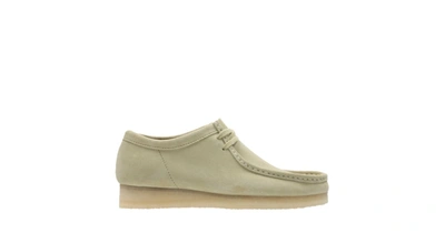 Shop Clarks Wallabee In Brown