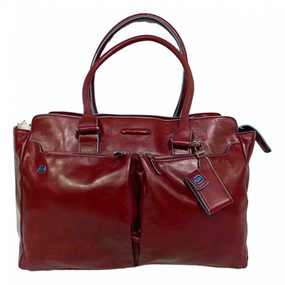 Pre-owned Piquadro Red Leather Handbag