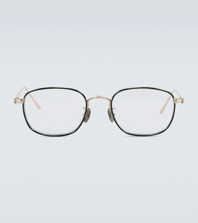 Shop Cartier Metal Frame Glasses In Black