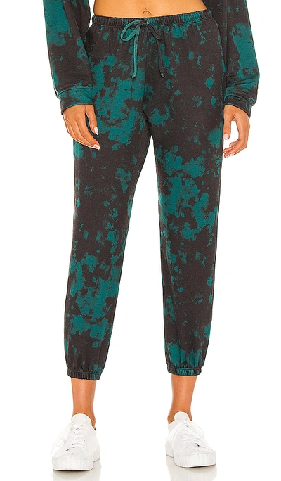 Shop Onzie Fleece Sweatpant In Emerald Tie Dye