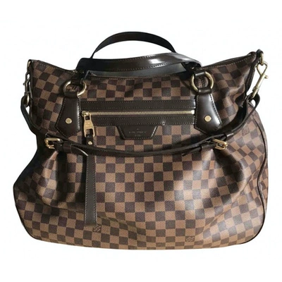 Pre-owned Louis Vuitton Evora Brown Cloth Handbag