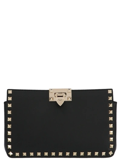 Shop Valentino Rockstud Bag In Black