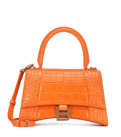 Shop Balenciaga Hourglass Small Leather Tote In Orange