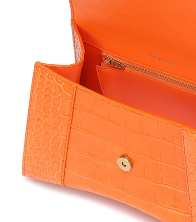 Shop Balenciaga Hourglass Small Leather Tote In Orange