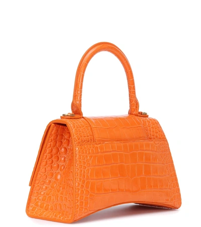 Shop Balenciaga Hourglass Small Leather Tote In Orange