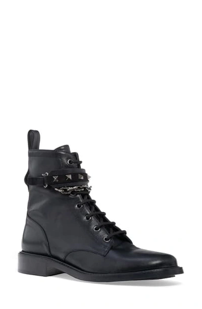 Shop Valentino Rockstud Chain Combat Boot In Black