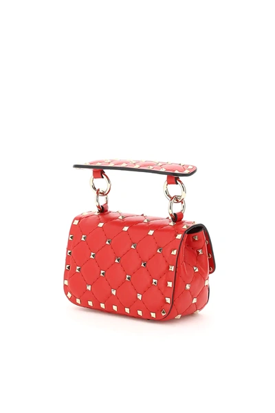Shop Valentino Rockstud Spike Micro Bag In Red