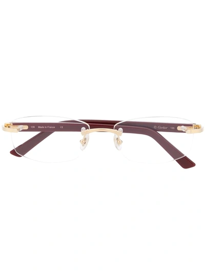 Shop Cartier Rimless Rectangular Optical Glasses In Red