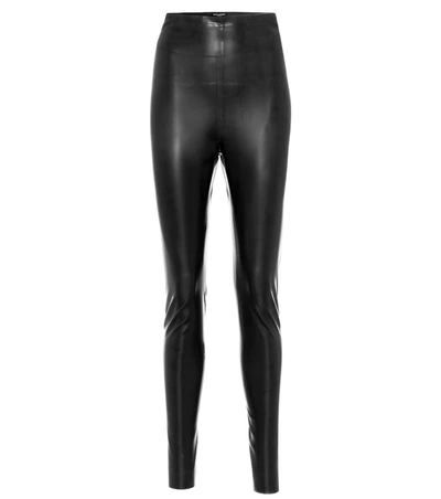 Shop Saint Laurent Latex Leggings In Black
