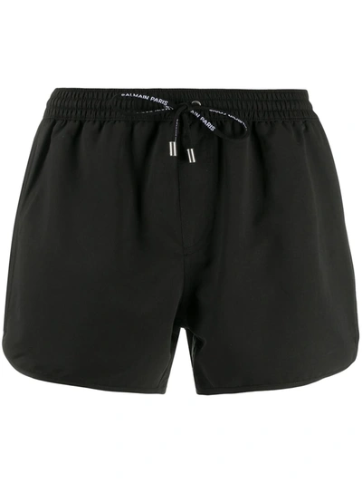 Shop Balmain Logo Stripe Swim Shorts In Black