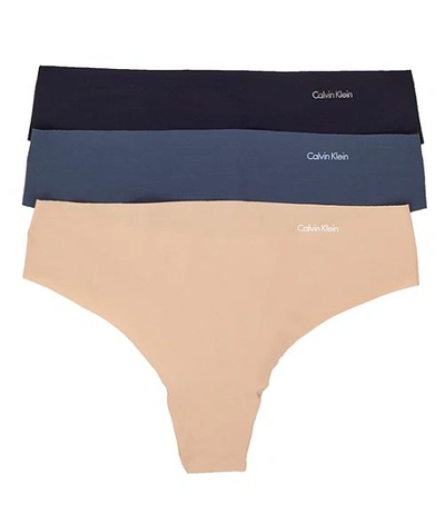 Shop Calvin Klein Invisibles Thong 3-pack In Black,blue,nude