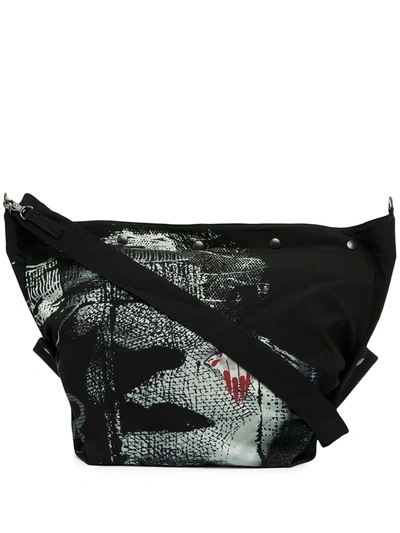 Shop Yohji Yamamoto Face Print Shoulder Bag. In Black