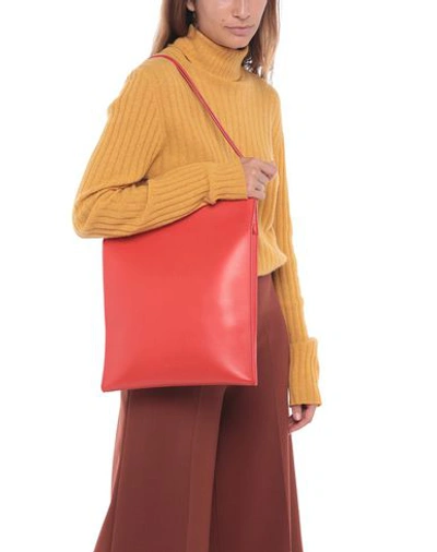 Shop Aesther Ekme Handbags In Red