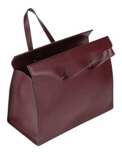 Shop Aesther Ekme Handbags In Maroon