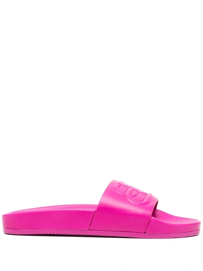 Shop Balenciaga Embossed Logo Leather Slides In Pink