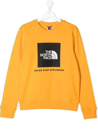 Shop The North Face Long-sleeved Logo T-shirt In Yellow
