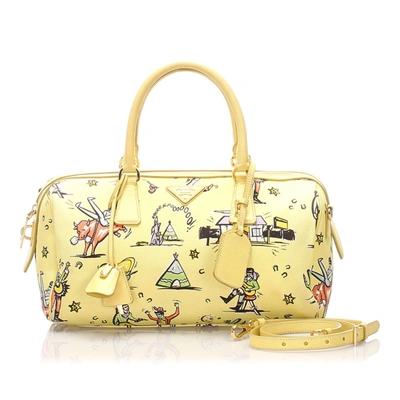 Shop Prada Printed Canvas Satchel In Yellow