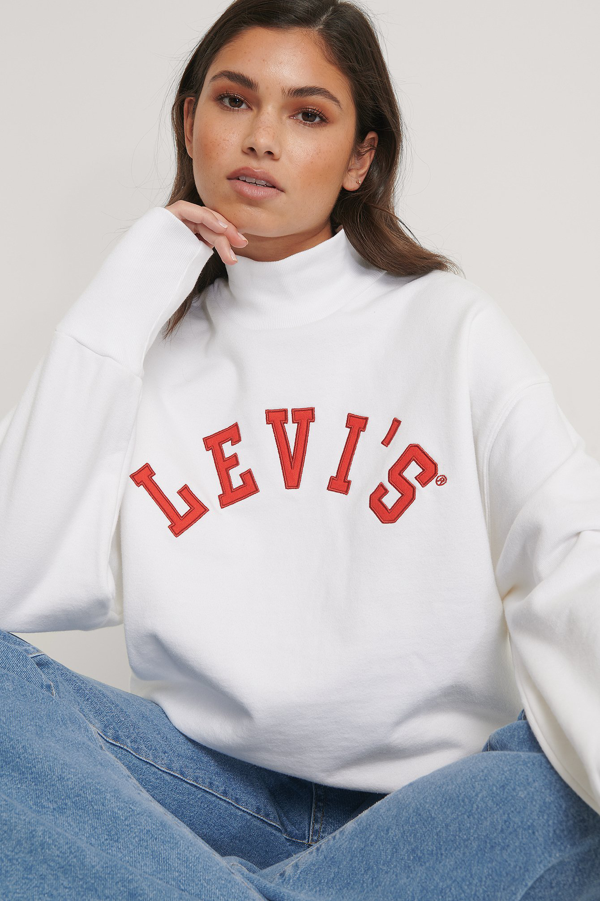 white levis sweater