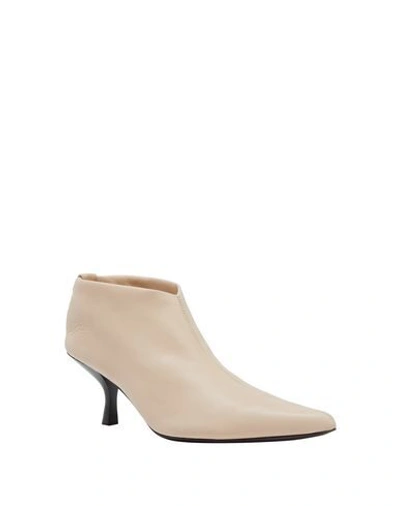 Shop The Row Ankle Boot In Sand