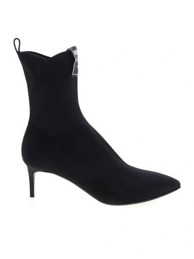 Shop Moschino Logo Label Pointed Ankle Boots In Black