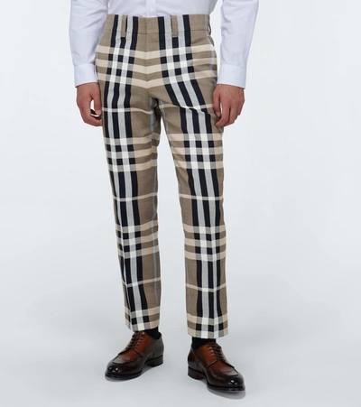 Shop Burberry Checked Pants In Beige