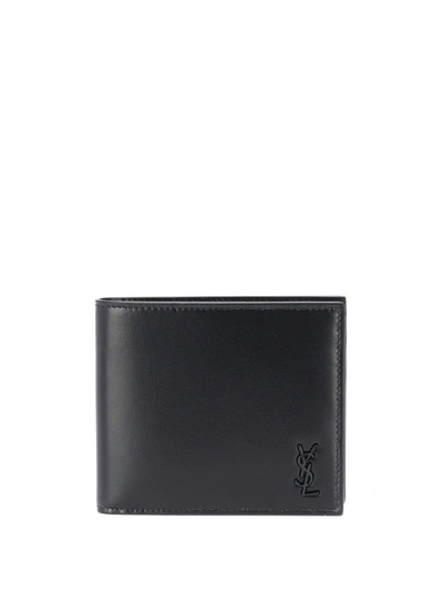 Shop Saint Laurent Embossed Logo Bi-fold Wallet In Black