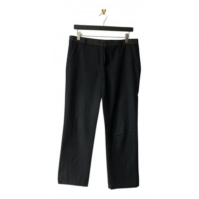 Pre-owned Miu Miu Wool Trousers In Black