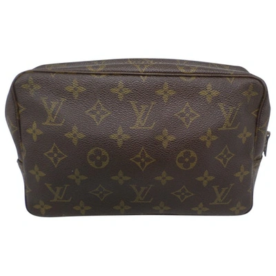 Trousse de toilette cloth travel bag Louis Vuitton Brown in Cloth