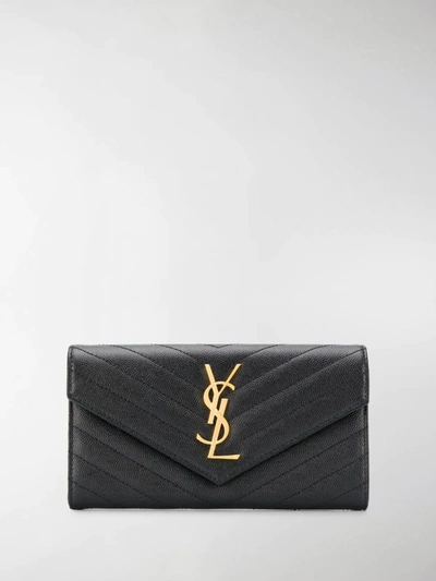 Shop Saint Laurent Large Monogram Flap Wallet In Black