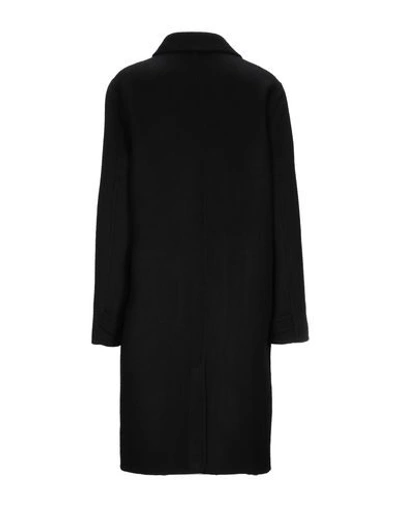 Shop Sandro Coats In Black