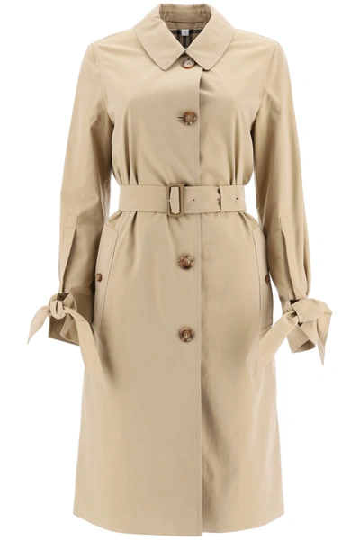 Shop Burberry Claygate Midi Trench Coat In Honey (beige)