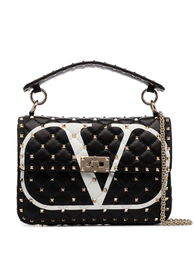Shop Valentino Rockstud Spike Leather Handbag In Black