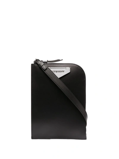 Shop Givenchy Logo-patch Messenger Bag In Black