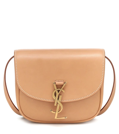 Shop Saint Laurent Kaia Small Leather Crossbody Bag In Brown