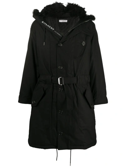 Shop Givenchy Furry Hood Belted Parka Coat In Black