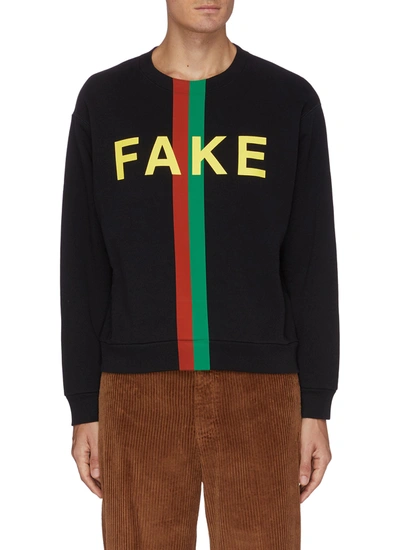 Shop Gucci 'fake' Slogan Print Sweatshirt In Black