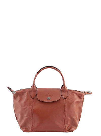 Shop Longchamp Le Pliage Cuir - Top Handle Bag In Sienna