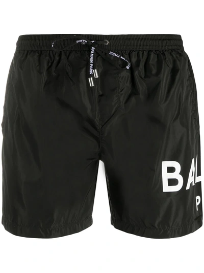 Shop Balmain Logo Print Swim Shorts In Black