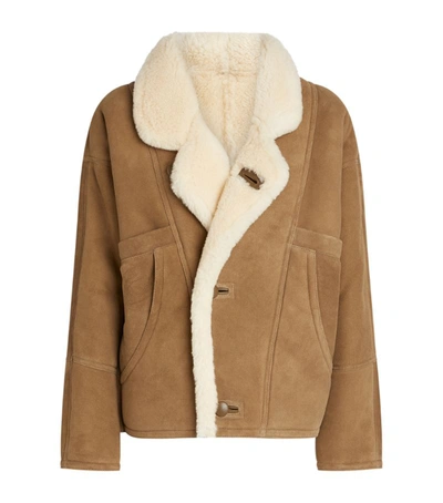 Shop Sandro Leather Shearling Coat